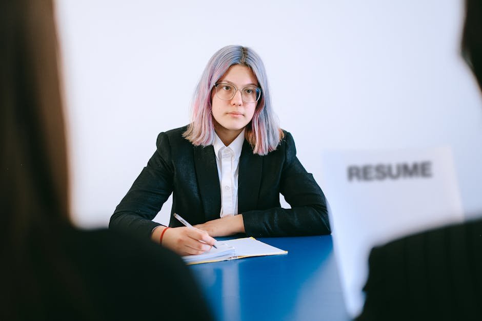 Young woman in a suit during a job interview
